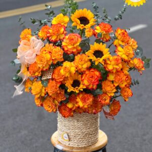 Giỏ hoa hồng cam mix hướng dương rực rỡ