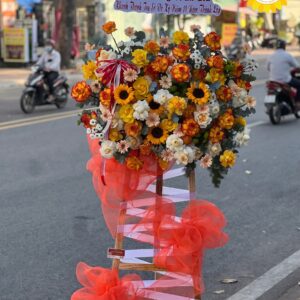 Kệ hoa chúc mừng khánh thành cam vàng rực rỡ
