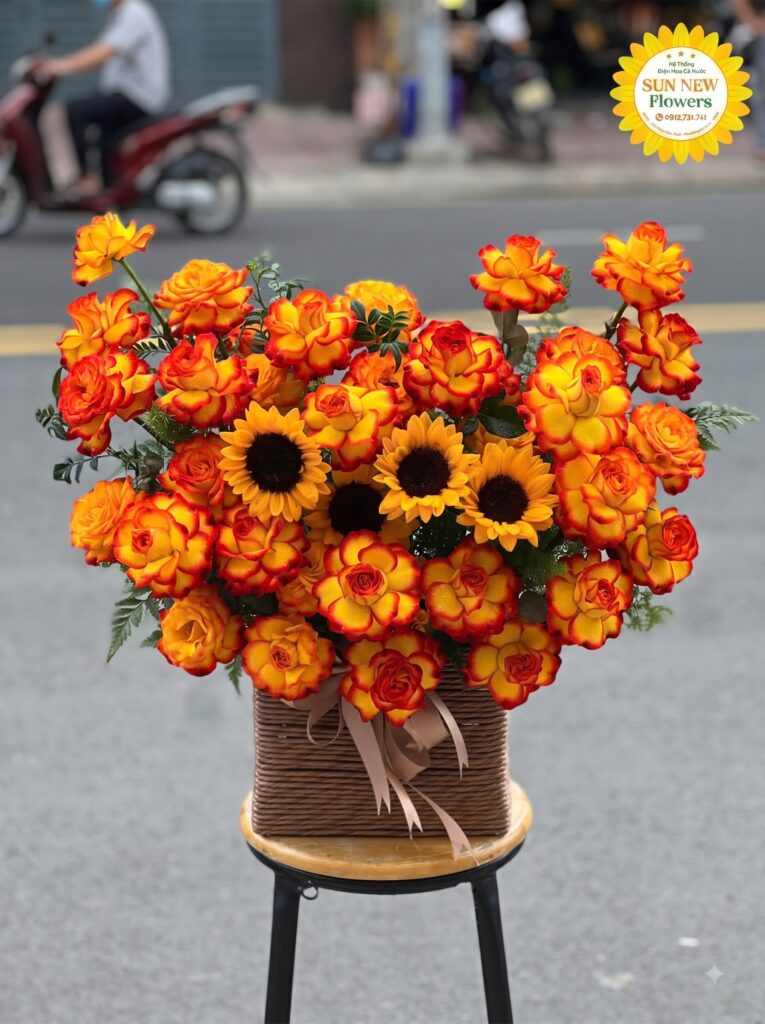 Giỏ hoa hồng cam lửa mix hướng dương rực rỡ
