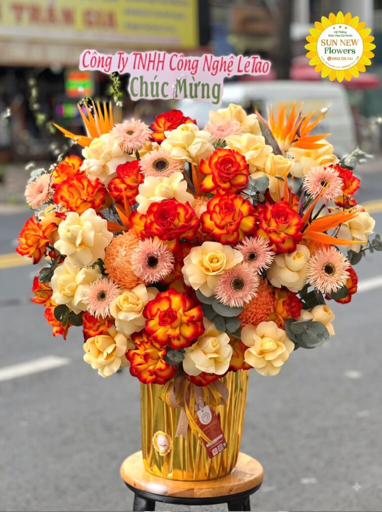 Giỏ hoa hồng cam mix thiên điểu chúc mừng khai trương
