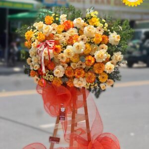 Kệ hoa chúc mừng đại hội vàng cam rực rỡ